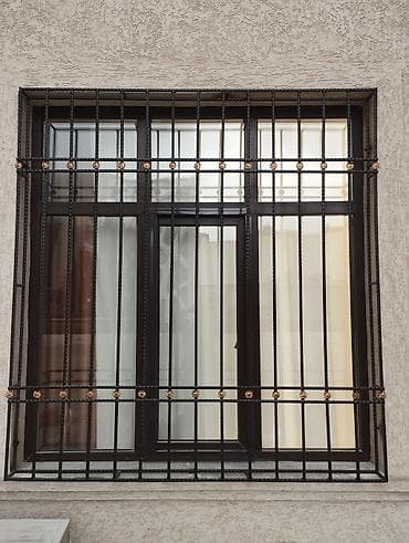 Dəmir pəncərə barmaqlıqları – fərqli dizaynlarda hazırlanmış dekorativ