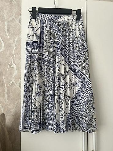 Ətəklər: Qadın ətəkləri dəsti 1) Cins ətək – tünd mavi rəngdə, ön hissə — 3