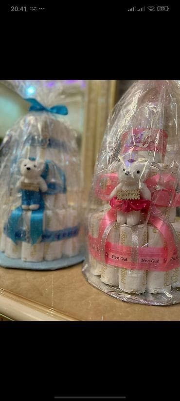 tort sekilleri qız üçün: Məhsul: Körpə üçün bez tortu (diaper cake) Təsvir: - 3 mərtəbəli — 3