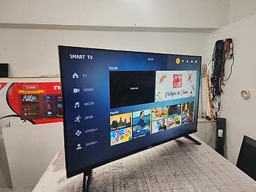 mini kondisener: TOKLA Smart TV – geniş funksiyalı televizor - Ekran: Təxminən 40–43 — 4