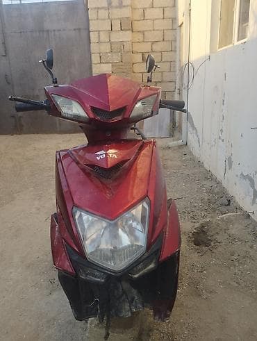 mopet elektrik: Moped qeza olunub qabag plasmaslari ezilib yanlari cizilib ama tok — 6