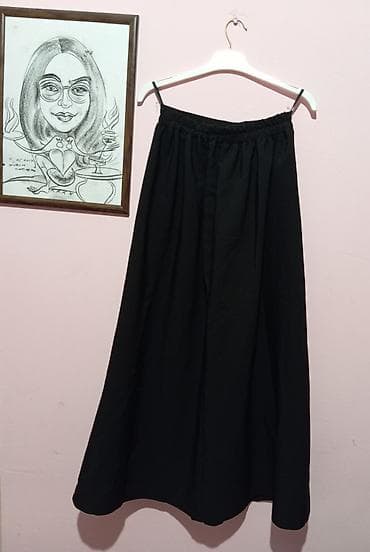 qaqa geyimi: Qadınlar üçün uzun, klassik qara ətək - Model: A-kəsim, axıcı siluet — 2