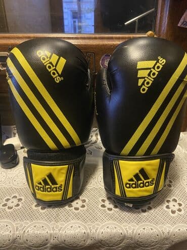 Toplar: Məhsul: Adidas boks əlcəyi (cüt) Təsvir: - Rəng: qara/sarı, klassik — 2