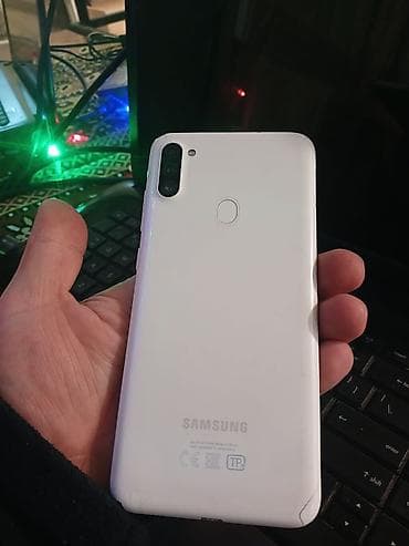 Видеоигры и приставки: Samsung Galaxy A11, цвет - Белый, Отпечаток пальца — 3