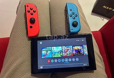nini: Nintendo Switch 1 v2 + Mario odyssey oyunu 260+ 60 Ideal veziyetde — 3