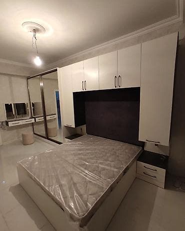Divar yataq mebel dolab carpayi sifarisle yigilir. Reng secimleri var