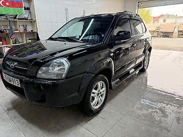 bmw e39: Hyundai Tucson: 2 l | 2007 il — 1