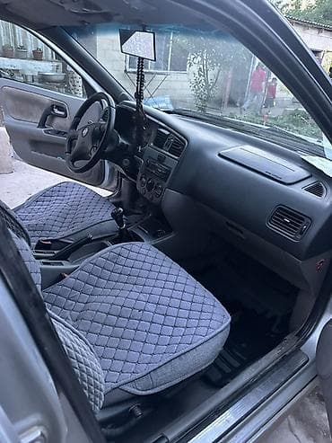 qosqu yeri: Nissan Primera Wagon – gümüş rəng, universal kuzov Xüsusiyyətlər: - — 5