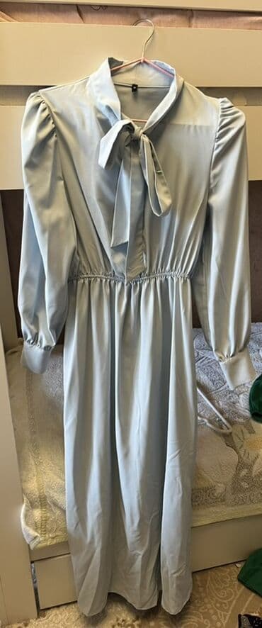 Məhsul: Açıq mavi rəngdə uzun don - Stil: Klassik və zərif siluet