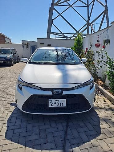 şüşə satışı: Toyota Corolla Touring Sports Hybrid – universal kuzovlu, ağ rəng — 9