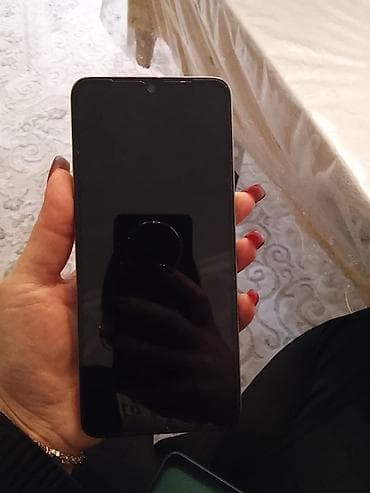 Redmi smartfon – zeytun-yaşıl arxa qapaqlı model Xüsusiyyətlər: -