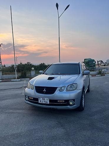 sam diskiler: Mitsubishi Airtrek (RHD) – şəhər və uzun yol üçün komfortlu krossover — 5