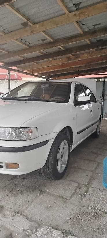 i̇ran: İran Khodro Samand sedan - Kuzov: ağ rəng, 4 qapı, sedandır - Nömrə — 4