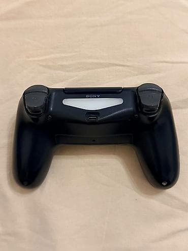 s10 tb: Playstation 4 slim 1 tb yaddasnan. Ev seraitinde istifade olunub.Hec — 6
