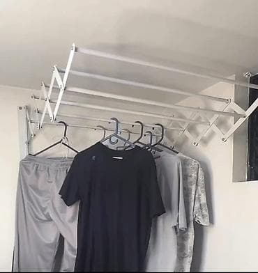 Divar tipli teleskopik paltar asılqanı/qarmaqlı quruducu Dəmir