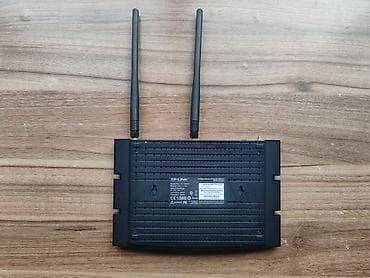 note: TP-Link 300Mbps Wireless N Gigabit ADSL2+ Modem Router (TD-W8970) Həm — 5