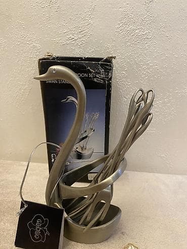 2 ədəddir. Gümüşü qu quşu desenli limon götürən