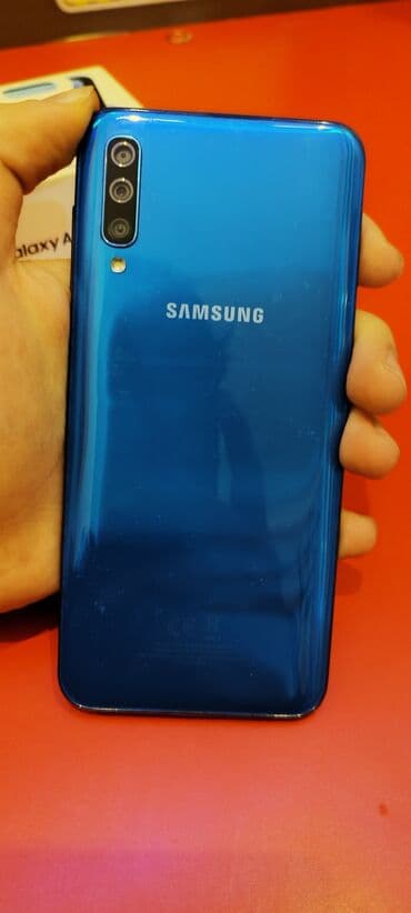 Samsung Galaxy A50, 128 ГБ, цвет - Голубой