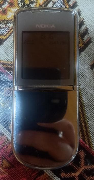 dubay telefonlari: Nokia rəng - Gümüşü, Düyməli — 1