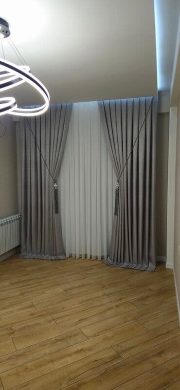 tül parçalar: Ağ rəngli, nazik, şəffaf parçadır. Üzərində həndəsi naxışlar var — 15