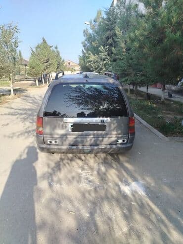 fortuna təkər: Opel Astra Caravan (şunur kuzov) Xüsusiyyətlər: - Kuzov — 1