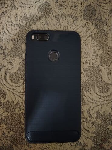 irşad redmi note 9 pro: Xiaomi Mi A1, 64 GB, rəng - Qara, 
 İki sim kartlı — 2