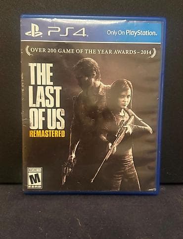 playstatio: PS4 üçün **The Last of Us Remastered** oyun diski. Bu nəşr — 1