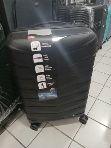 купить чемодан на колесах: Dörd təkərli səyahət çantası, möhkəm materialdan hazırlanmışdır və — 11