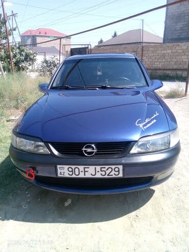 Su nəqliyyatı: Opel Vectra sedan – mavi rəng - Kuzov: 4 qapılı sedan, göy/mavi rəng — 3