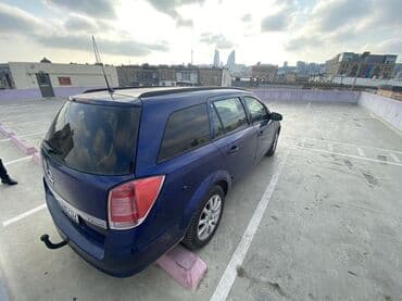 07 masin: Opel Astra: 1.9 l | 2006 il 330000 km Universal — 2