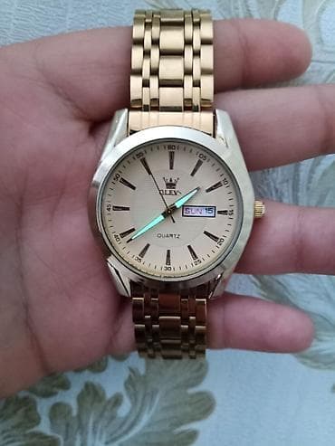 OLVES Quartz saatdır bu modelin işlenmemişi 70-80 AZN arası 4 gün