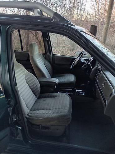 qezali avtomobil: Jeep Grand Cherokee: 4 l | 1993 il Ofrouder/SUV — 8