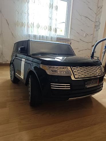 Uşaq üçün elektrikli minik maşını - Korpus: qara rəngli SUV dizaynı