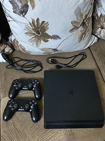 PlayStadion 4 slim 1TB yaddas icinde 29 oyun var hamısı bahalı yeni