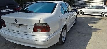 prius qapi: BMW 5 Series E39 sedan – ağ rəng Xüsusiyyətlər: - Korpus: 4 qapılı — 3