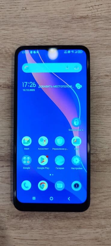 TCL 6102H Təsvir: TCL smartfon. Ön tərəfdə geniş ekranlı, nazik