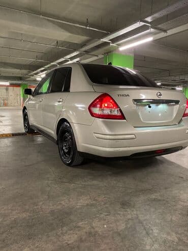 mercedes disk teker type 1 per page 40: Nissan Tiida sedan - Kül rəngə çalan açıq-bej eksteryer - 4 qapılı — 3