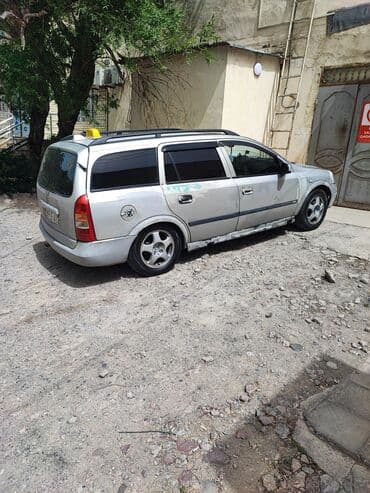 xanımlar ucun maşınlar: Opel Astra: 1.6 l | 1998 il Universal — 7