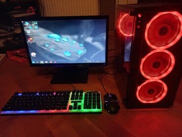 kompyuter hisseleri: Qabaqda üç ədəd mavi işıqlı ventilyatoru olan qara rəngli kompüter — 7