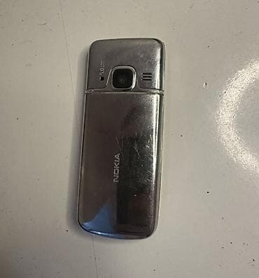 telefonu nokia 6700 telefonu al: Nokia 6700 Slide, rəng - Gümüşü, Düyməli — 2