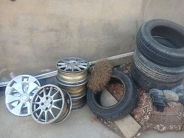 R 15 disq teker tekerlerin 1 i 20 manat 4 eded di