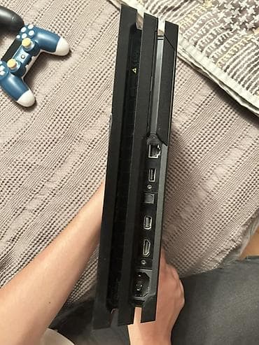 iphone 12 pro: PlayStation 4 Pro 1tb (PS4 Pro) oyun konsolu komplekti Paketə — 2