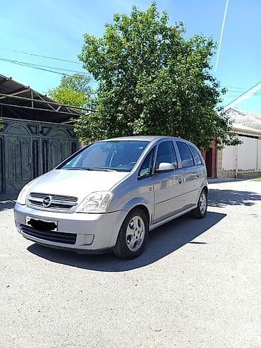 15 lik disklər: Opel Meriva: 1.4 l | 2005 il 400000 km Van/Minivan — 3