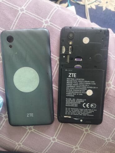 телефон fly fs526: ZTE Zinger, цвет - Черный, Две SIM карты — 2