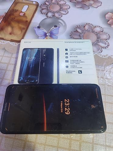 printer 3 u birində: Nokia X6, rəng - Qara, Barmaq izi — 4