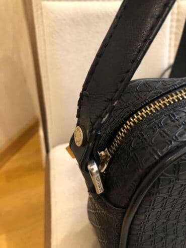 qaşlı çanta: US Polo ASSN canta seliqeli yaxsi vezyyetdedir. Ancaq qulpu — 3