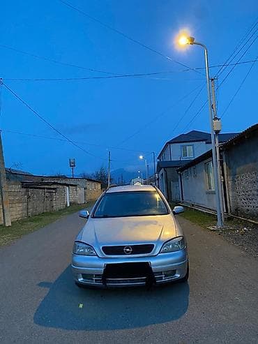 turbo az gazel: Opel Astra Caravan (universaI) – gümüşü rəng Xüsusiyyətlər: - Kuzov — 3