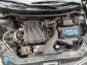 c klass mersedes: Nissan Tiida: 1.8 l | 2007 il Sedan — 15