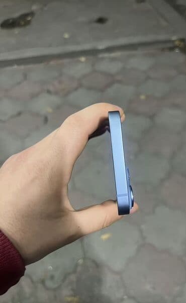 a 12 telefon: IPhone 14, Mavi, Face ID — 5