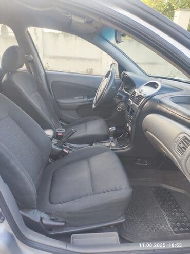 motosiklet telefon tutucu: Nissan Sunny: 1.6 l | 2008 il Sedan — 11